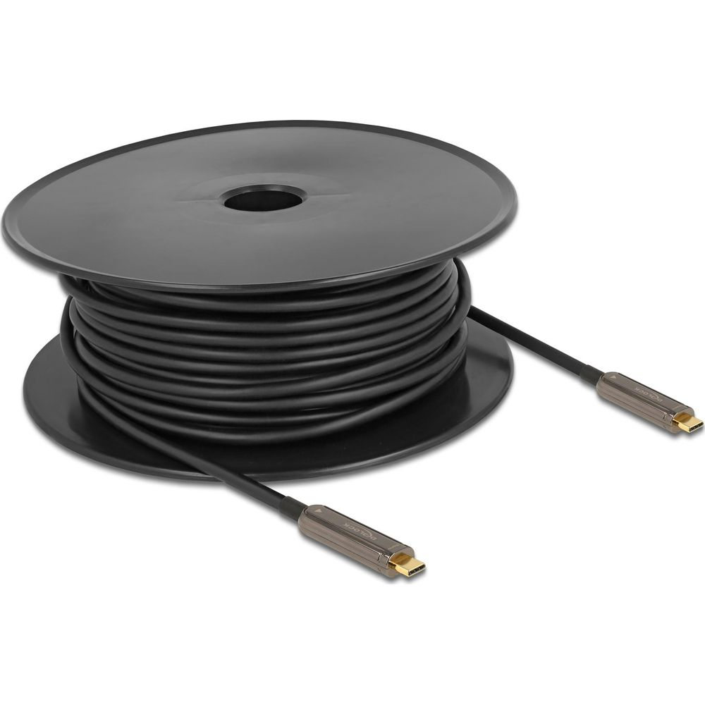 Schwarzes Kabel auf schwarzer Spule mit zwei USB-C-Anschlüssen.