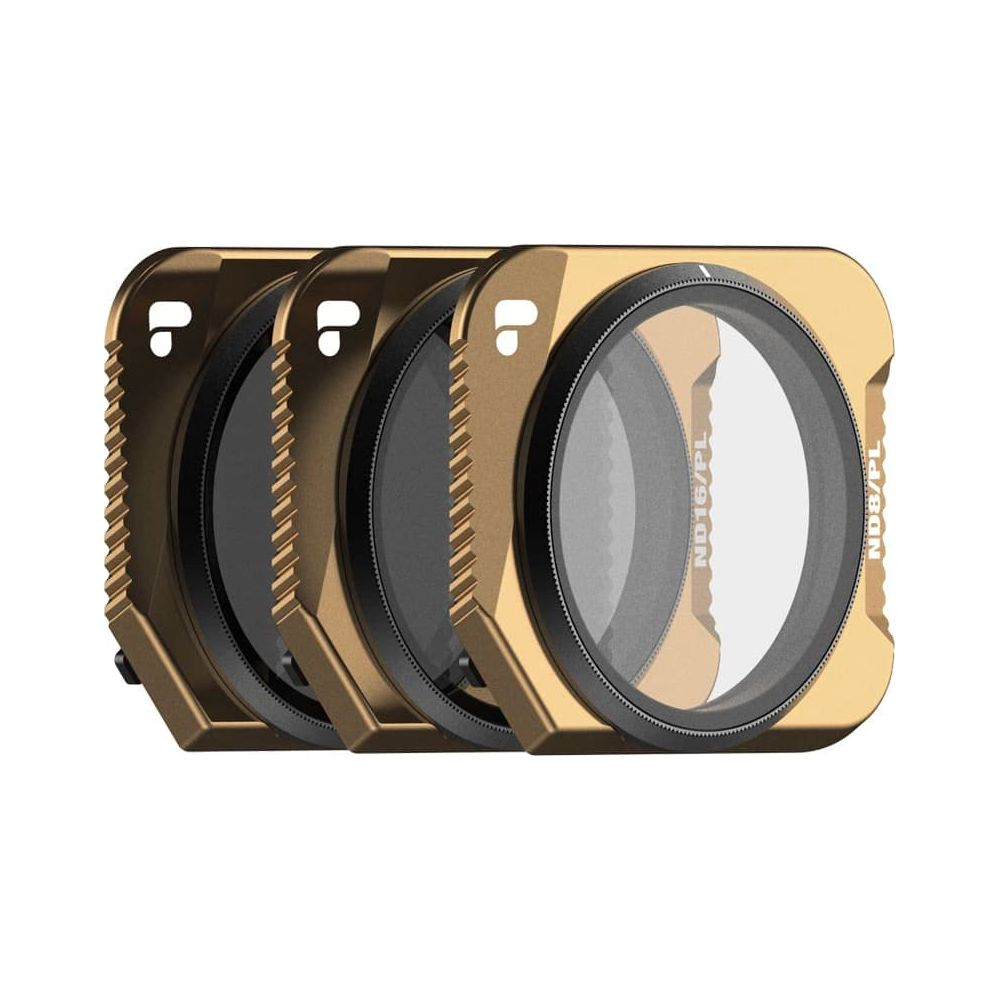 Cztery złote filtry fotograficzne z oznaczeniami ND16/PL i ND8/PL leżą obok siebie.