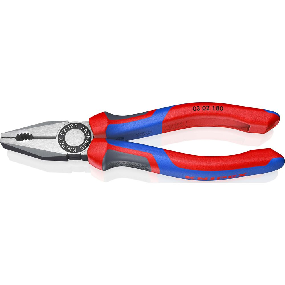 Kombinerki z czerwono-niebieskimi uchwytami leżą na białym tle.