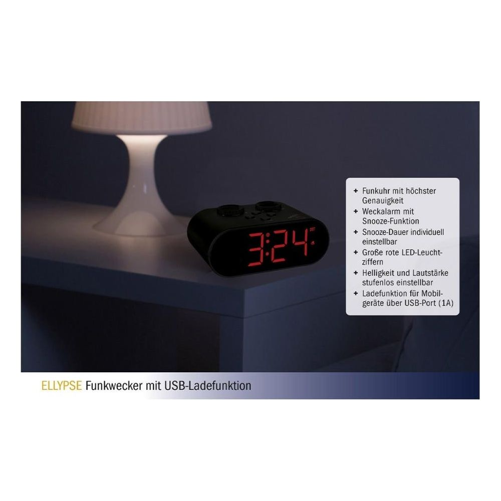 Ein schwarzer Radiowecker mit roten LED-Ziffern zeigt 3:24 an. Daneben eine Lampe.
