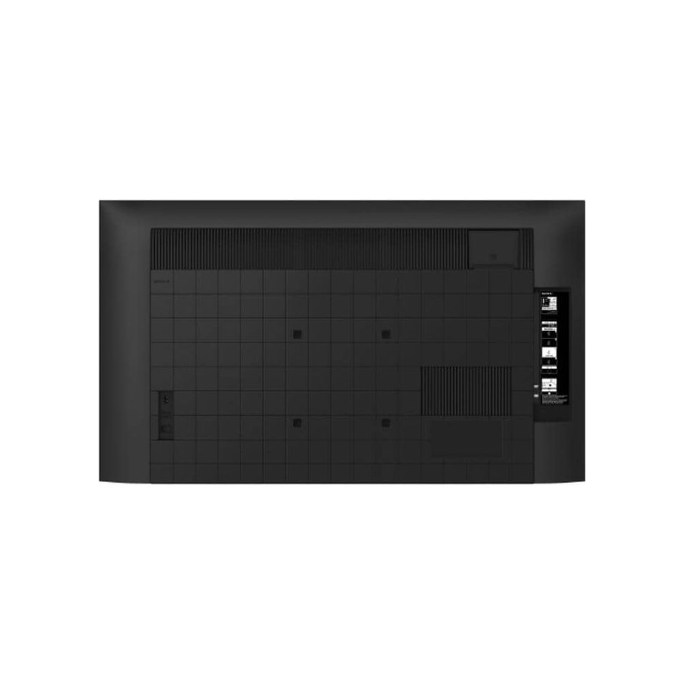 Tył czarnego telewizora z otworami wentylacyjnymi i portami. Teksturowana kratka.