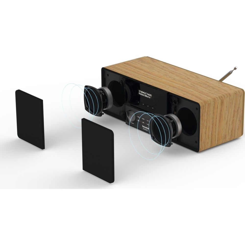 Radio in legno con altoparlanti staccati e onde sonore blu.