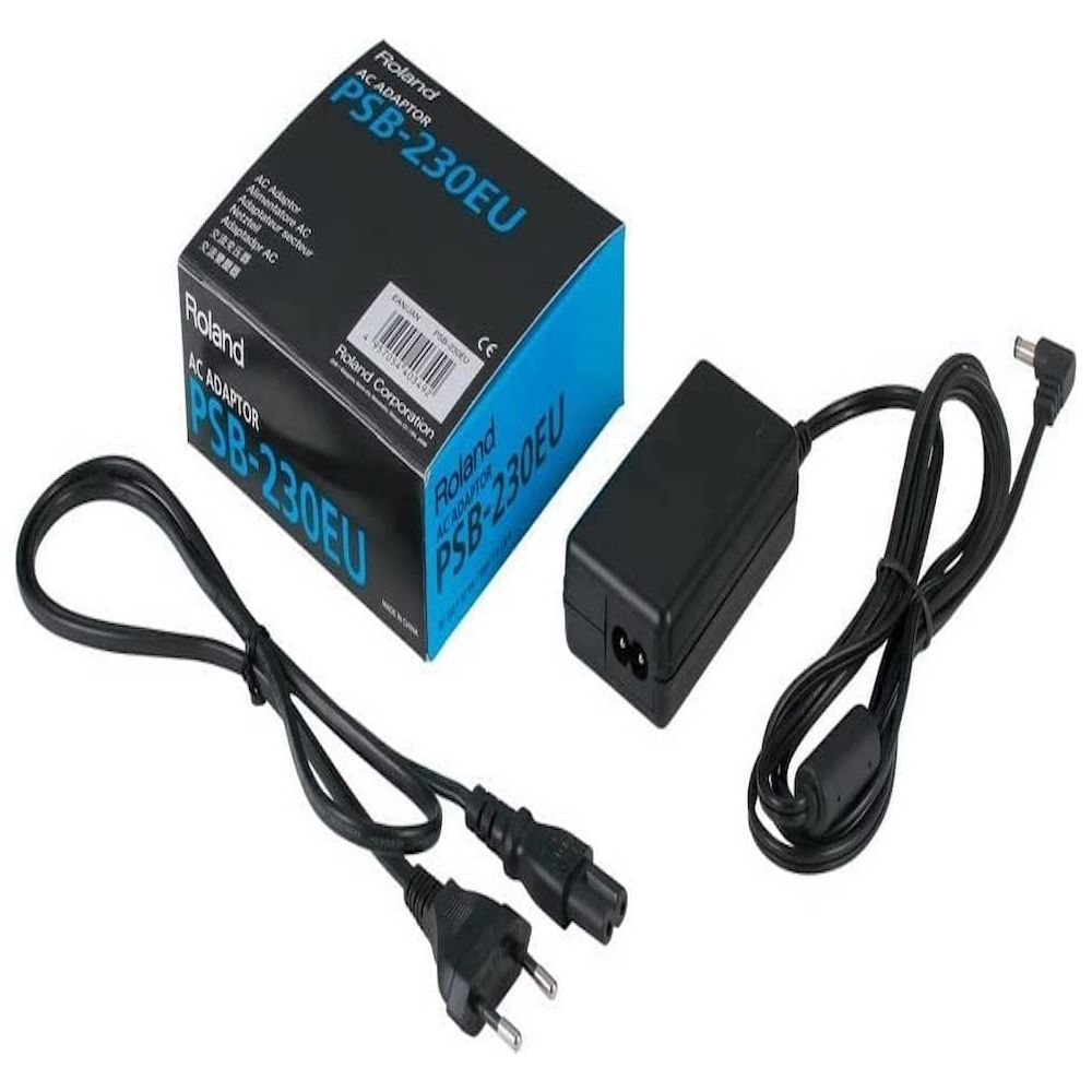 Roland AC adaptor PSB-230EU with box and cables on white background.