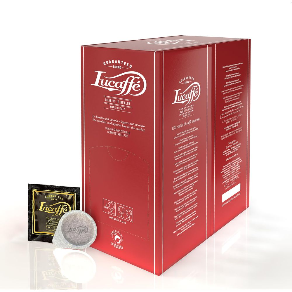 Rote Verpackung mit Lucaffé Kaffee-Pads und einer einzelnen Kaffeekapsel.