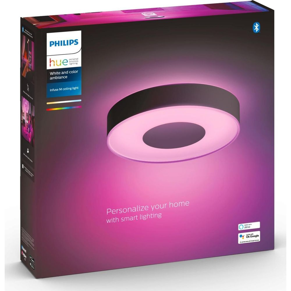 Opakowanie lampy sufitowej Philips Hue z różowo-fioletowym światłem.