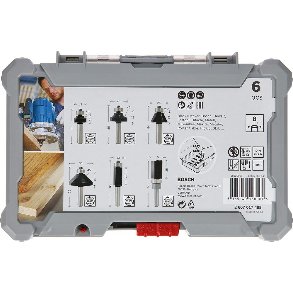 Grauer Koffer mit Bosch Fräser-Set. Sechs Bits mit verschiedenen Schneidkanten.