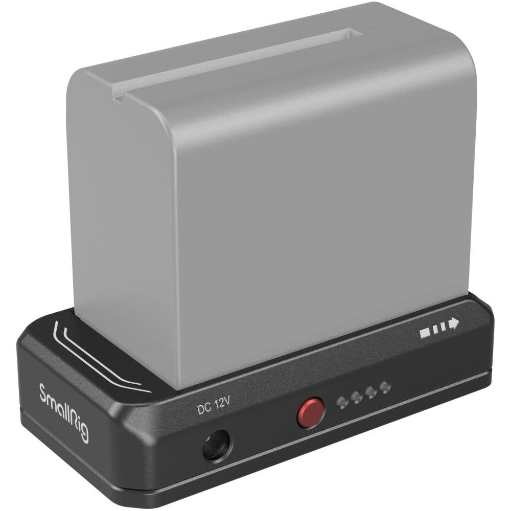 Batteria grigia su base caricatore nera con DC 12V e spie.