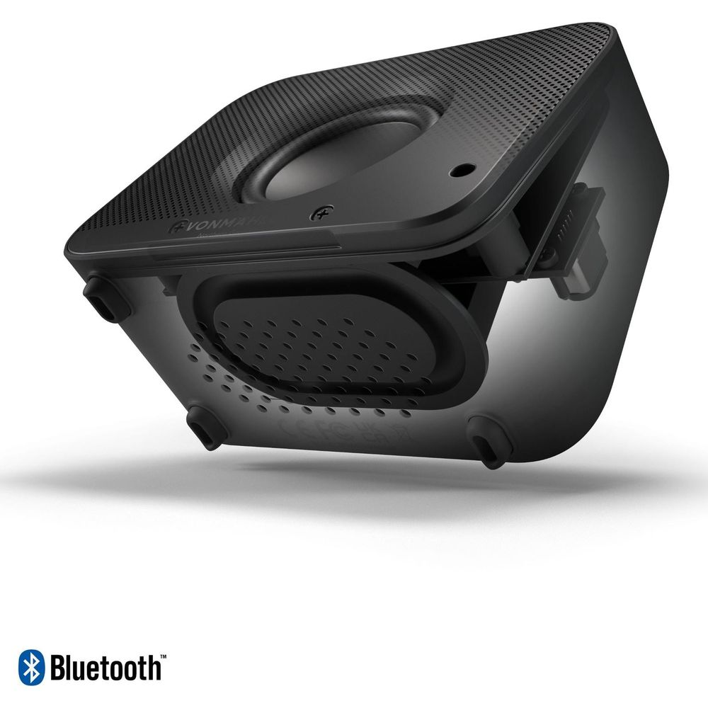 Schwarzer Bluetooth-Lautsprecher mit sichtbaren Treibern und perforierter Oberfläche.