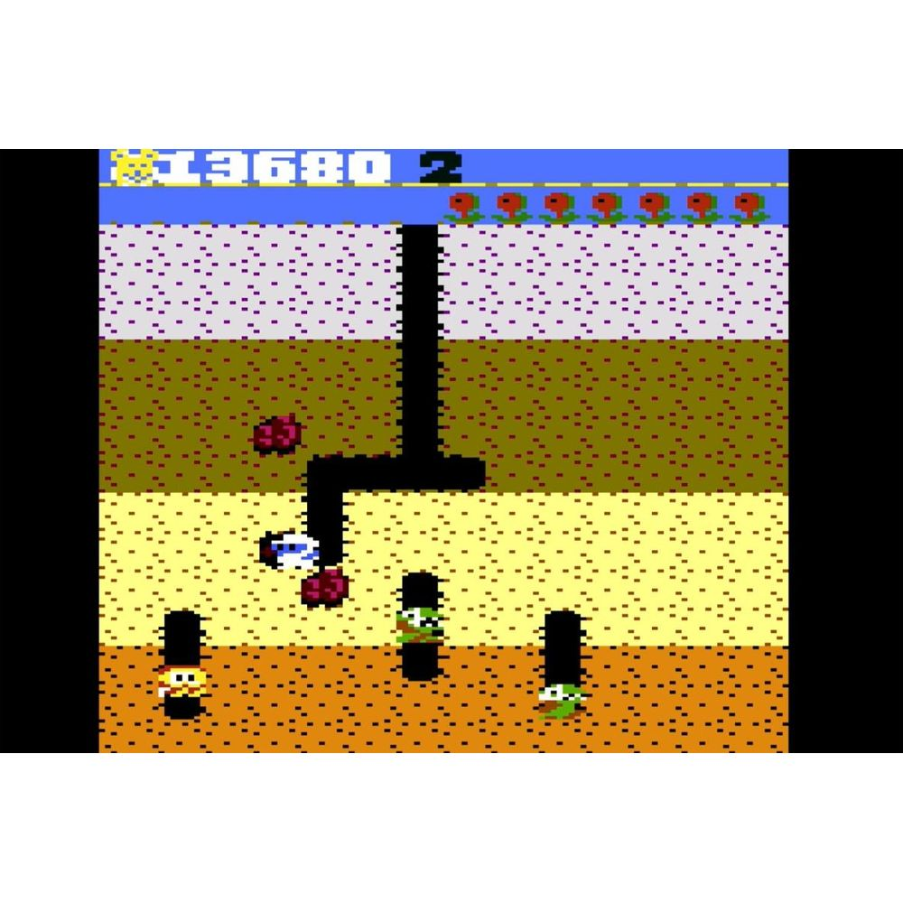 Gra w stylu pixel art z pojazdem zbierającym czerwone owoce.