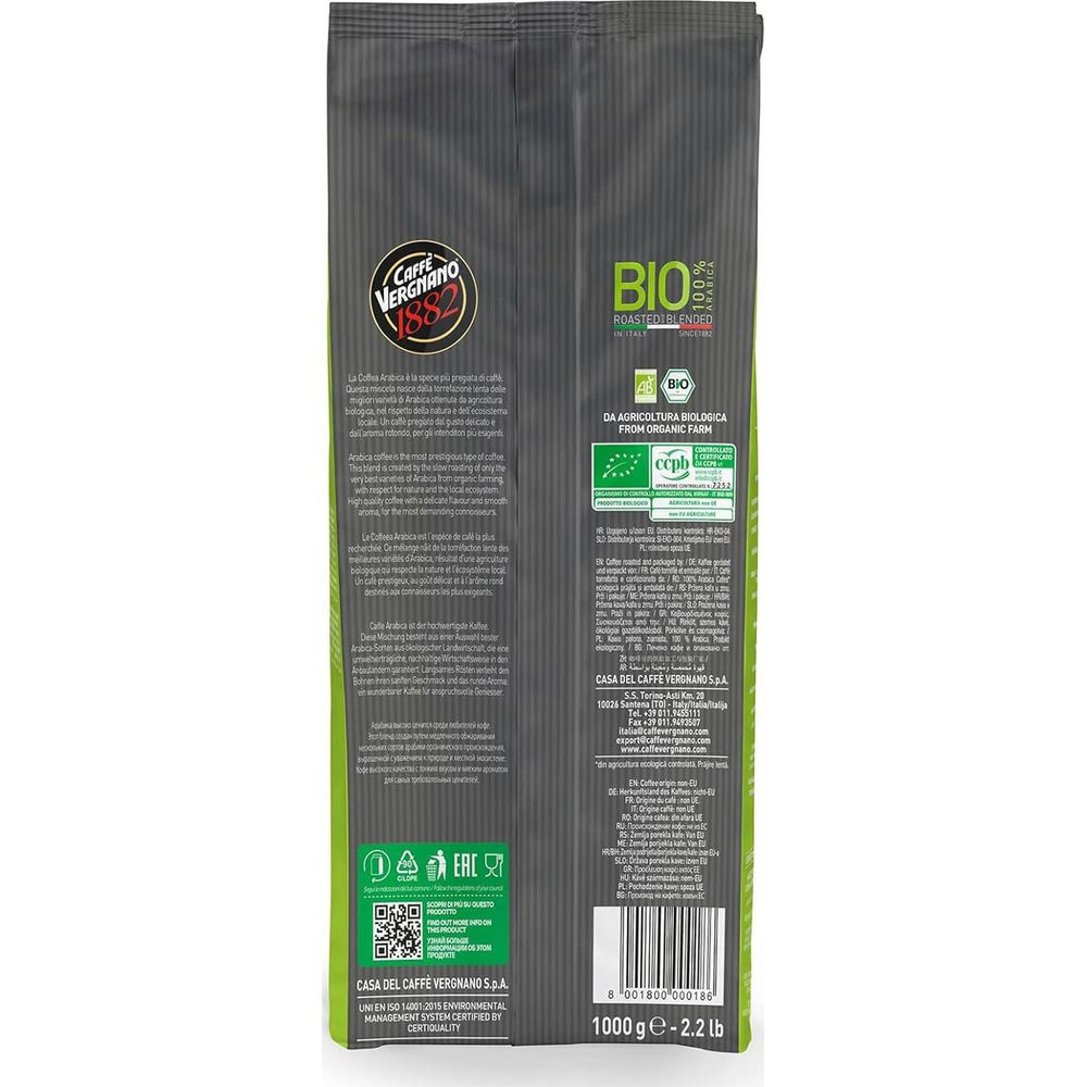 Grüne Kaffee-Verpackung mit Bio-Siegel und Text in mehreren Sprachen.