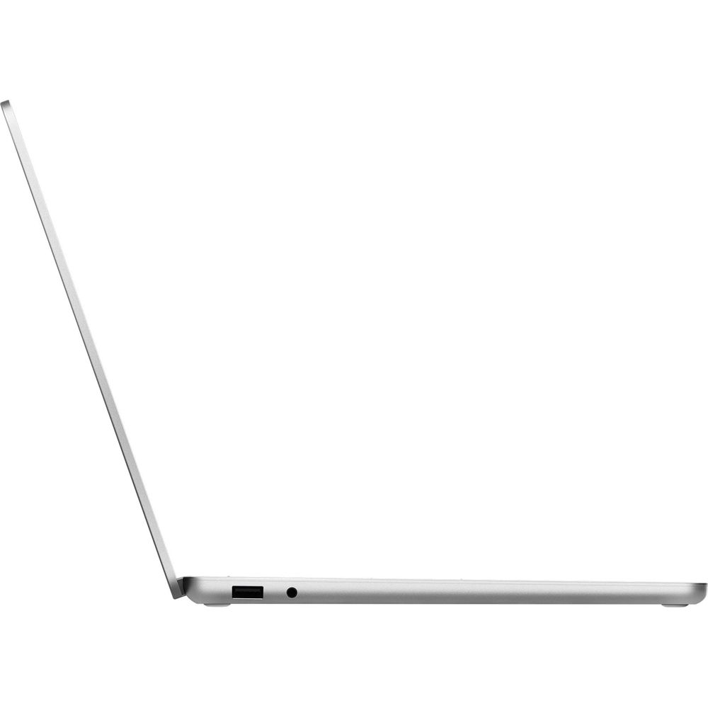 Ein silberner Laptop ist von der Seite gezeigt, mit geöffnetem Bildschirm.