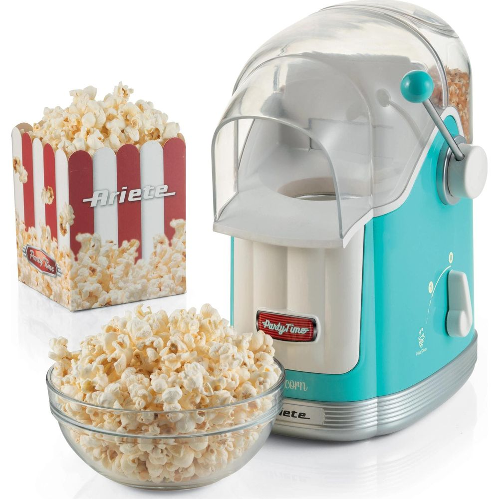 Una macchina per popcorn turchese con una ciotola e una scatola di carta piene di popcorn.