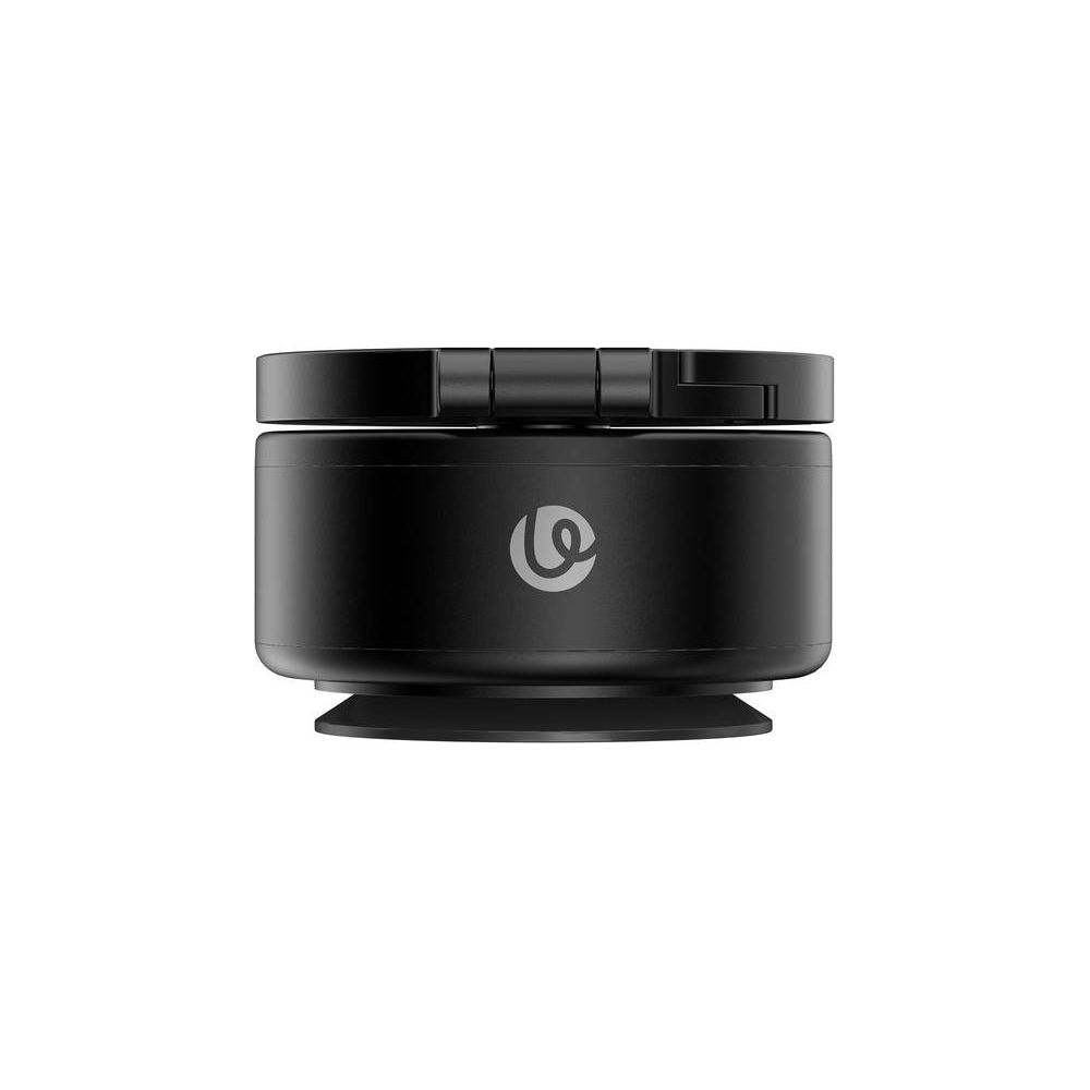 Czarny, okrągły przedmiot z stylizowanym symbolem 'S' pośrodku.