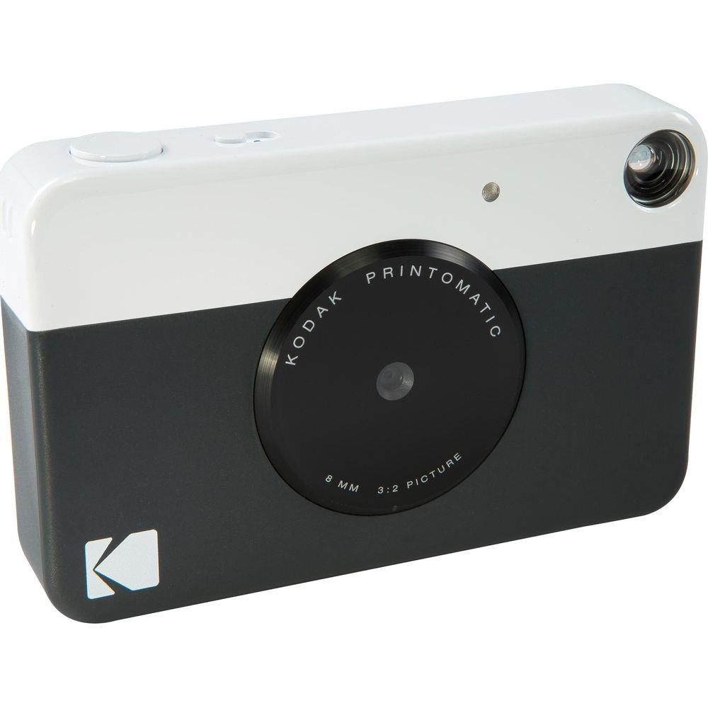 Una fotocamera Kodak Printomatic bianca e grigia con obiettivo nero e logo K.