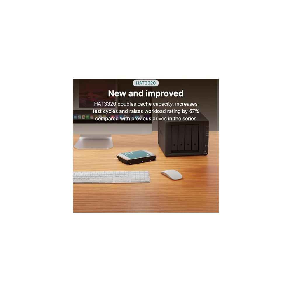 A NAS device, hard drive, keyboard, and mouse on a wooden desk.