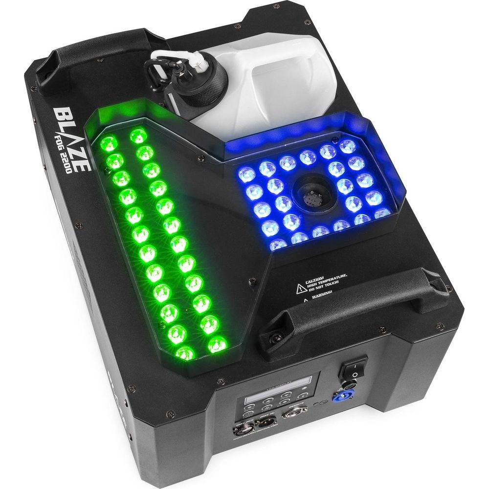 Una máquina de humo negra con luces LED verdes y azules y un tanque de líquido blanco.