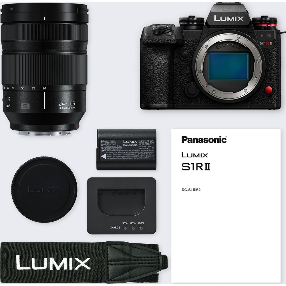 Ein Panasonic Lumix S1RII Kamerasystem mit Objektiv, Akku, Ladegerät und Gurt.