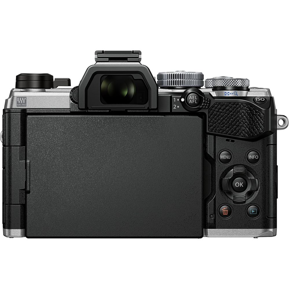 Vista posteriore di una fotocamera argento e nera con mirino, schermo LCD e pulsanti.