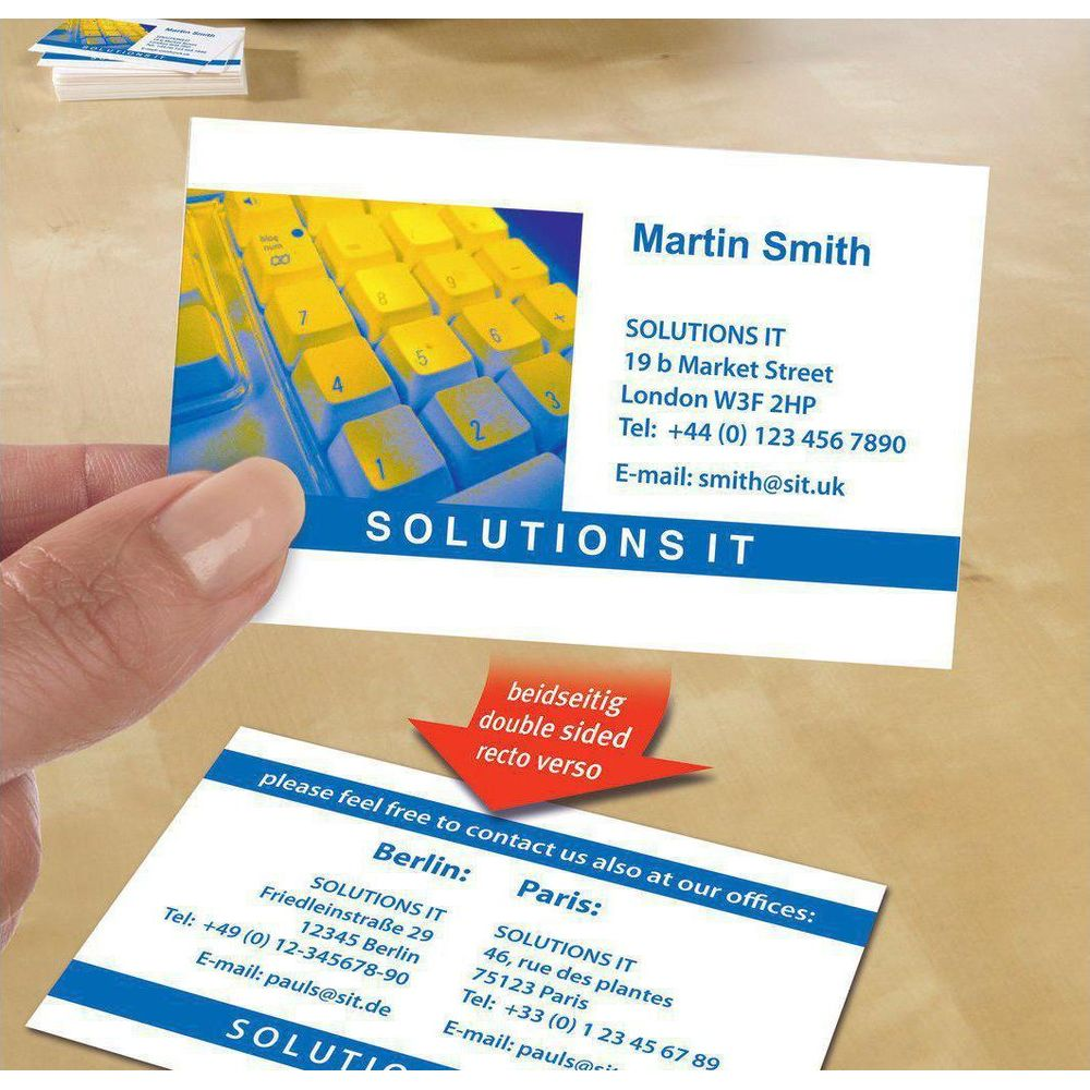 Visitenkarte von Martin Smith mit Tastatur, Adresse und Kontaktdaten.
