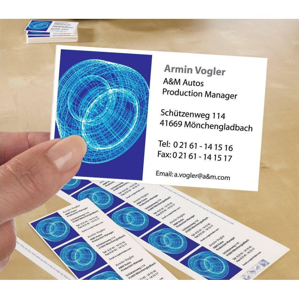 Visitenkarte mit blauem Netzmuster und Kontaktdaten von Armin Vogler.