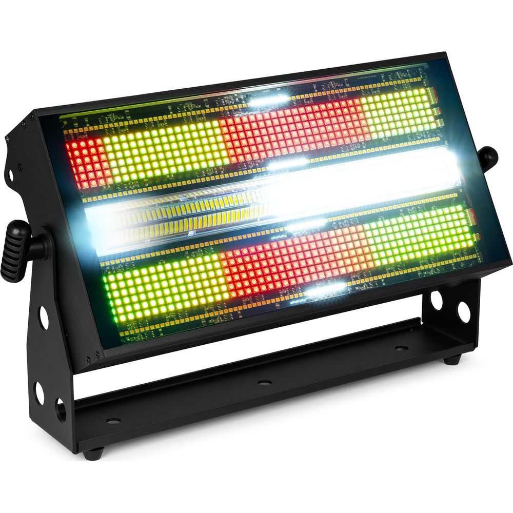 Un aparato de iluminación negro con paneles LED que muestran luces rojas, verdes y blancas.