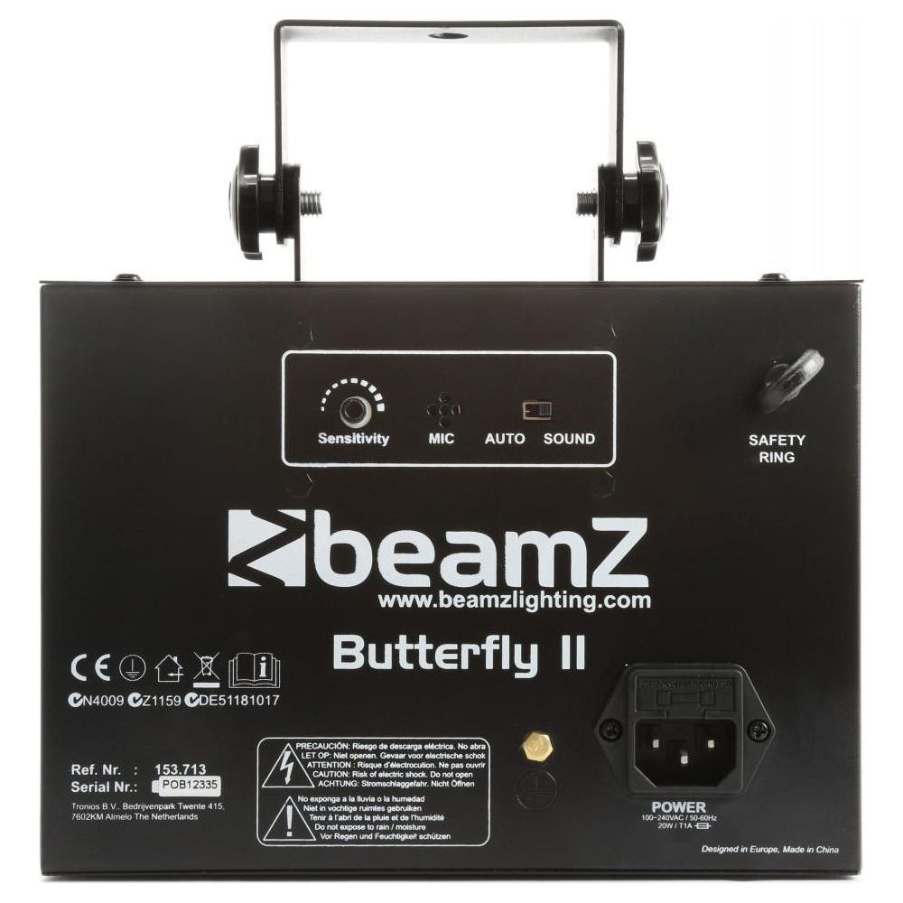 Dispositivo de luz negra con controles, conectores y etiquetas de advertencia.