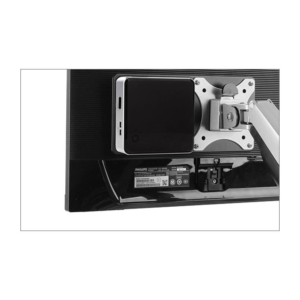 Back of a monitor with a black box and silver arm attached.