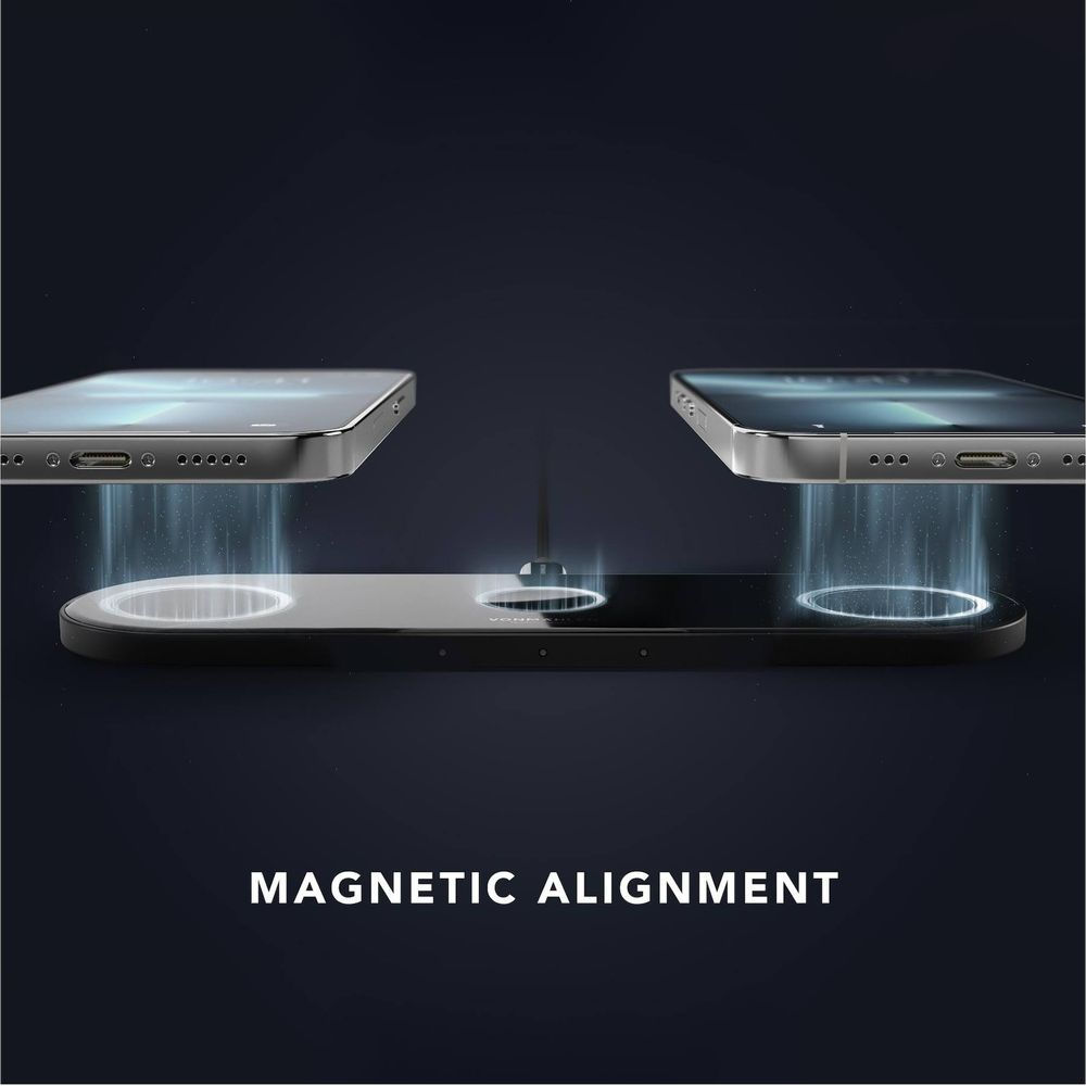 Zwei Smartphones werden von einem schwarzen Ladegerät magnetisch ausgerichtet.
