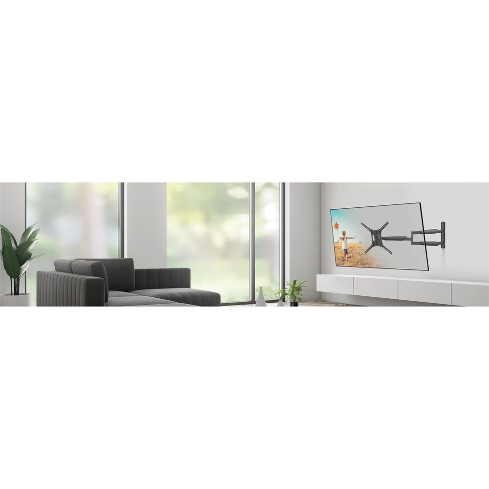 A dark sofa and a wall-mounted TV in a modern living room.