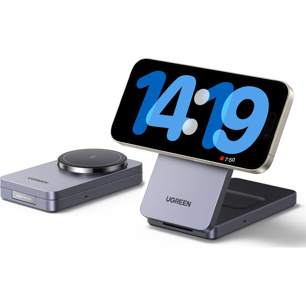 Smartfon na stojaku ładującym obok okrągłej podkładki ładującej.