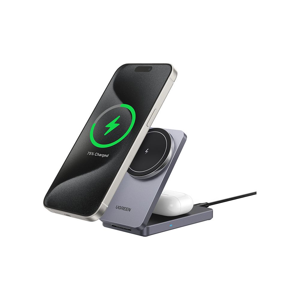 iPhone ładuje się na podstawce, obok etui ładujące.