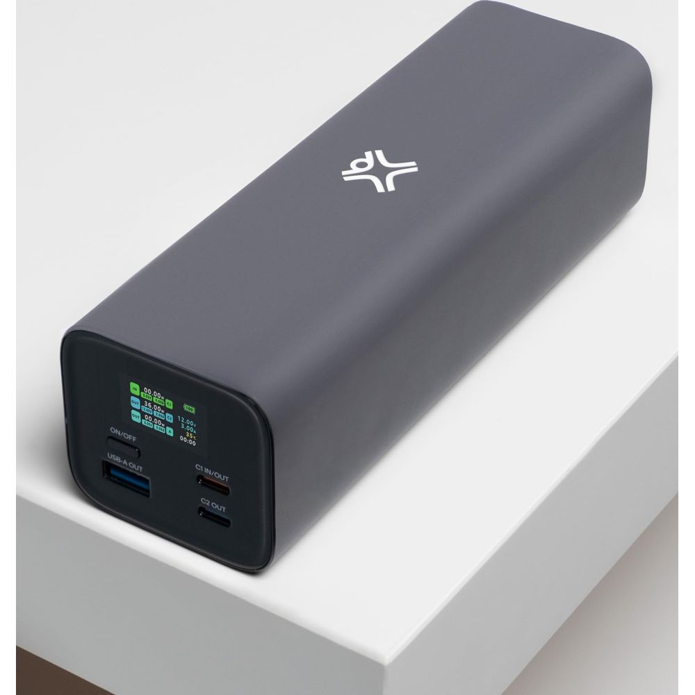 Batterie externe grise avec écran LCD, ports USB-A et USB-C.
