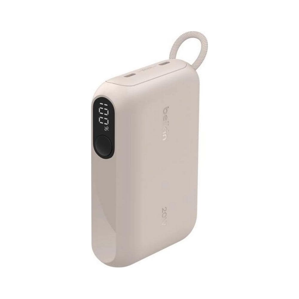 Un power bank beige con display digitale al 100% e un anello.