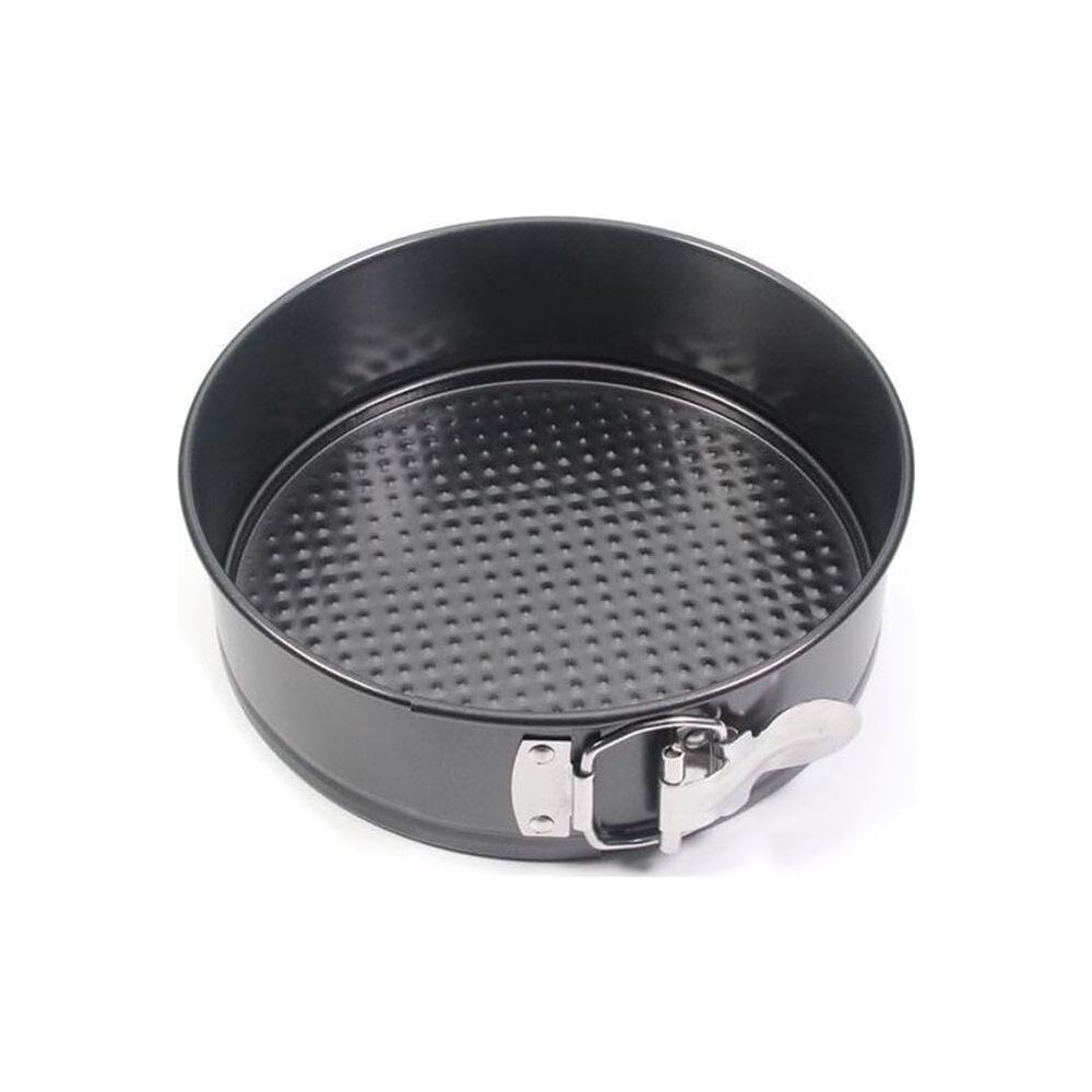Un moule à manqué rond et gris avec un mécanisme de fermeture sur le côté.