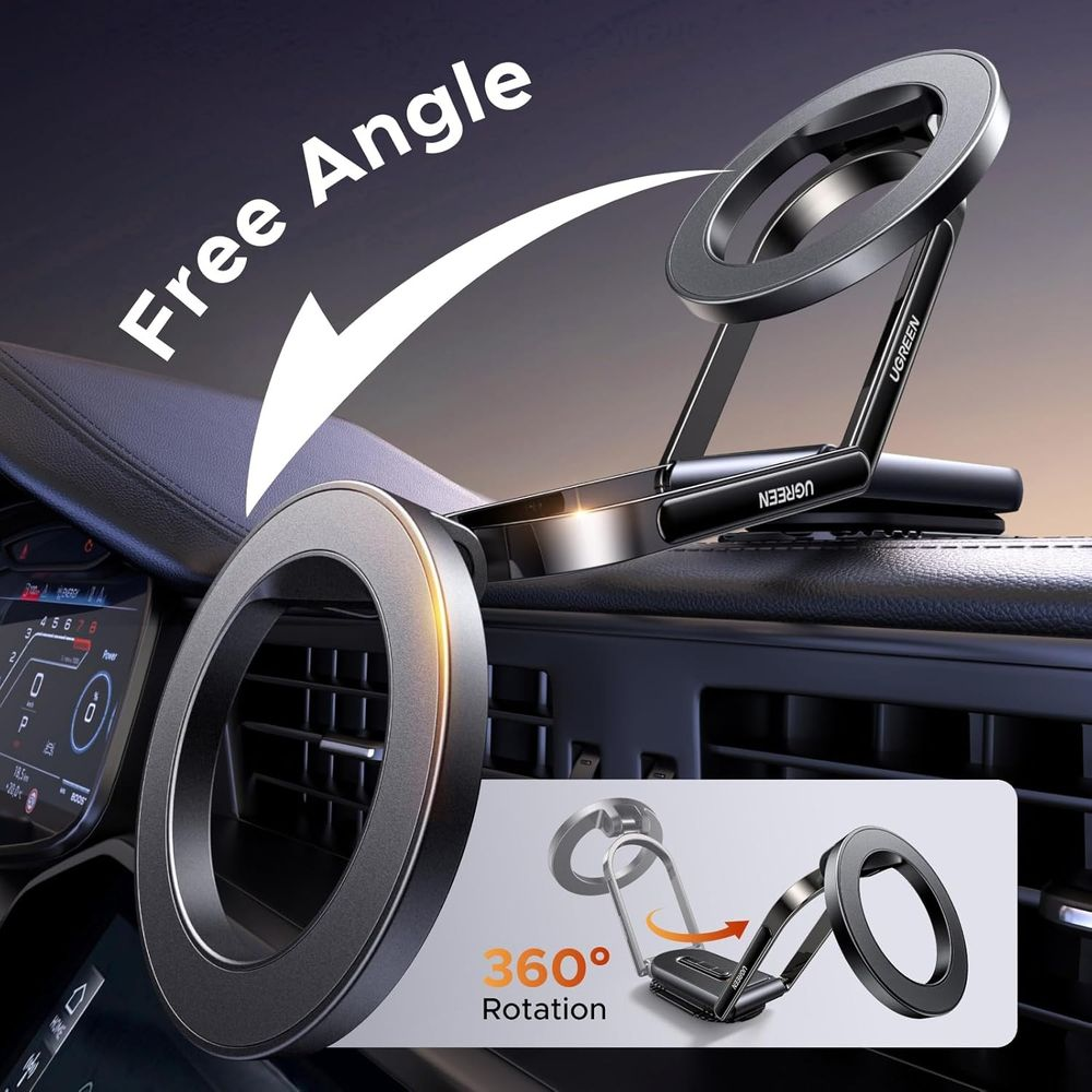 Czarny uchwyt na telefon na desce rozdzielczej samochodu z pierścieniem z przodu.