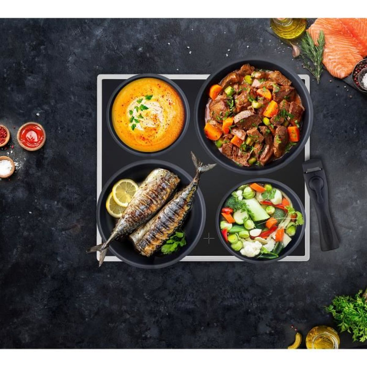 Gekochte Gerichte: Suppe, Eintopf, Fisch und Gemüse auf einem Kochfeld.