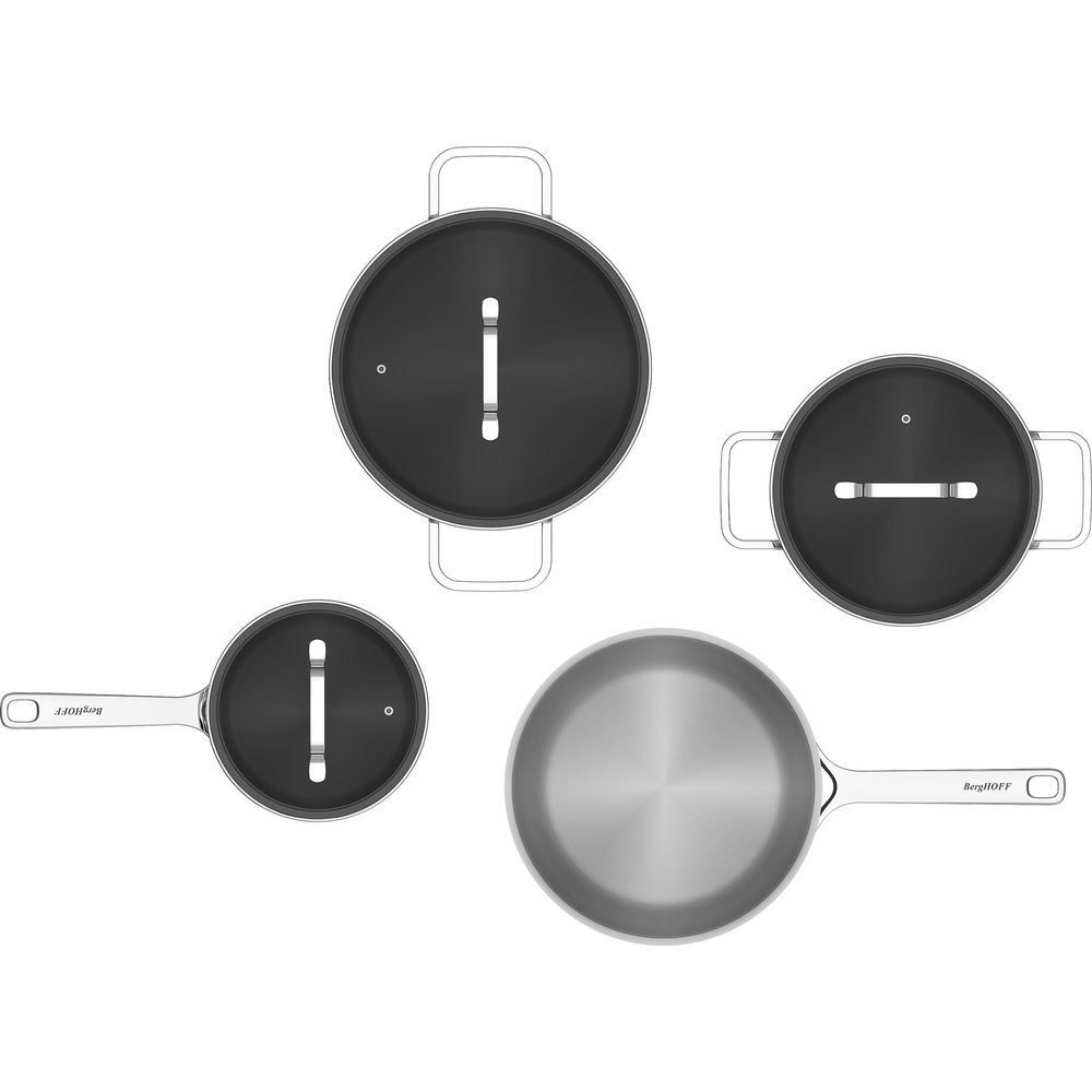 Three black pot lids with handles and one silver pot with a handle.