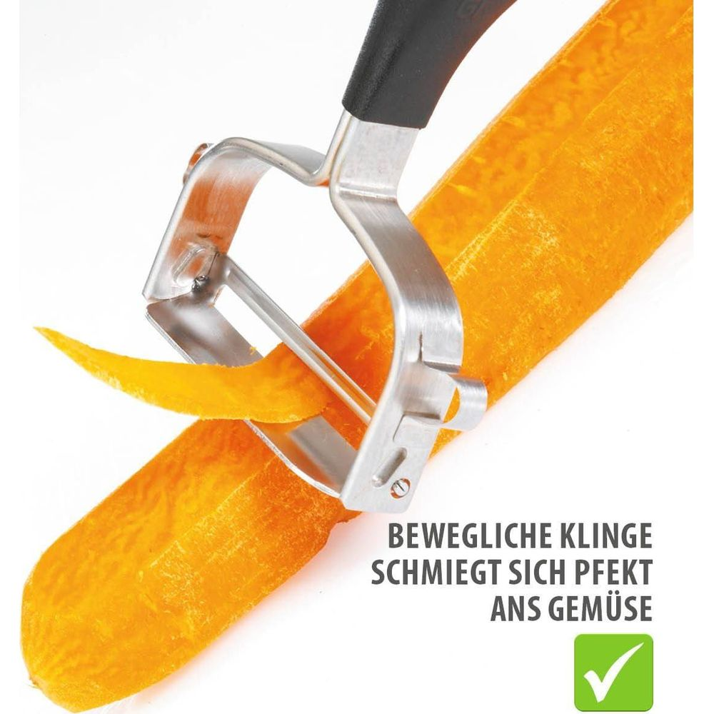 Obieraczka obiera marchewkę, usuwając skórkę.