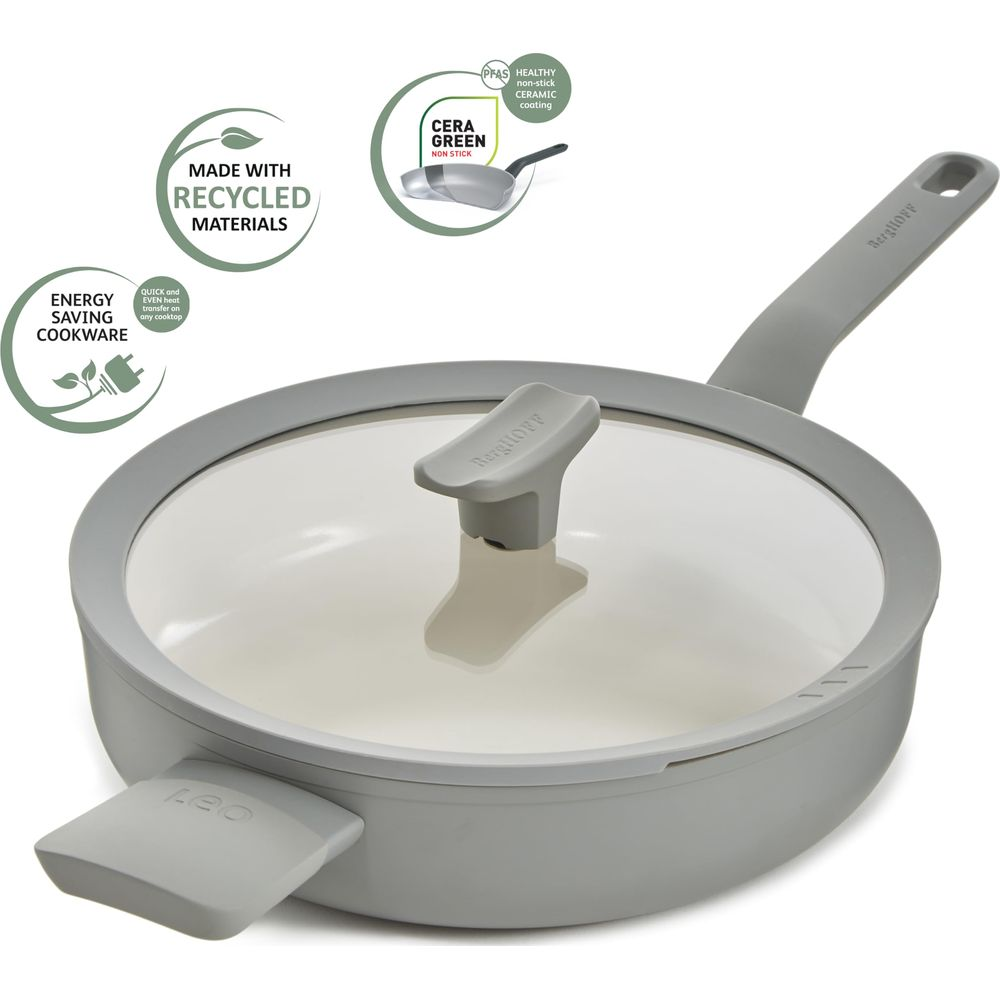 Grey frying pan with glass lid and handles, featuring labels for recycling and energy saving.