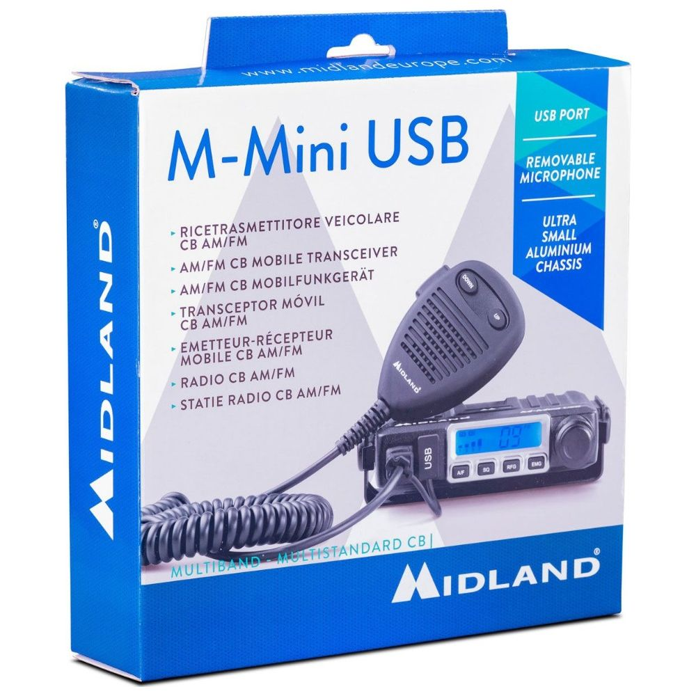 Radio CB Midland M-Mini USB con microfono e display su scatola di cartone.
