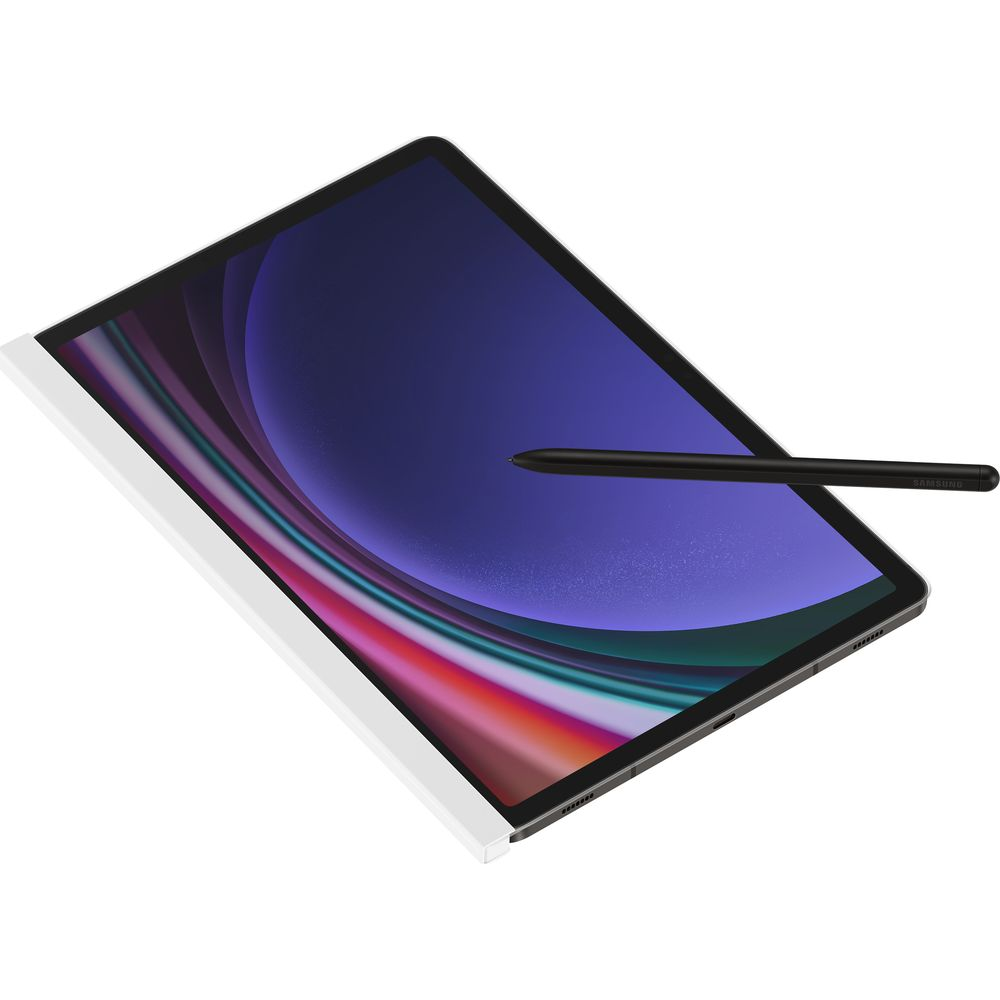 Un lápiz óptico negro descansa sobre una tableta con fondo morado y colorido.