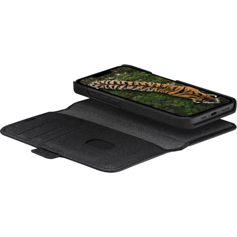 Un telefono a conchiglia nero con immagine di tigre sullo schermo.