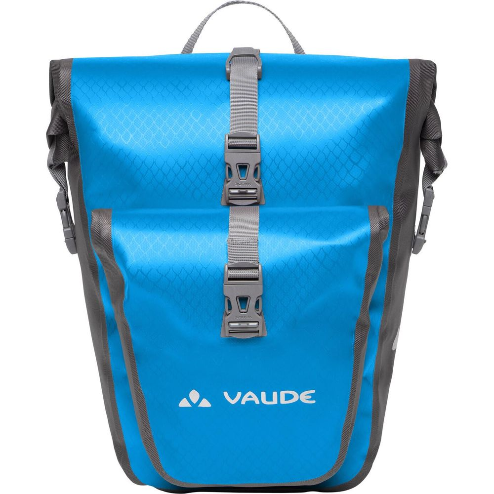 Niebieska torba rowerowa Vaude z szarymi paskami i klamrami.