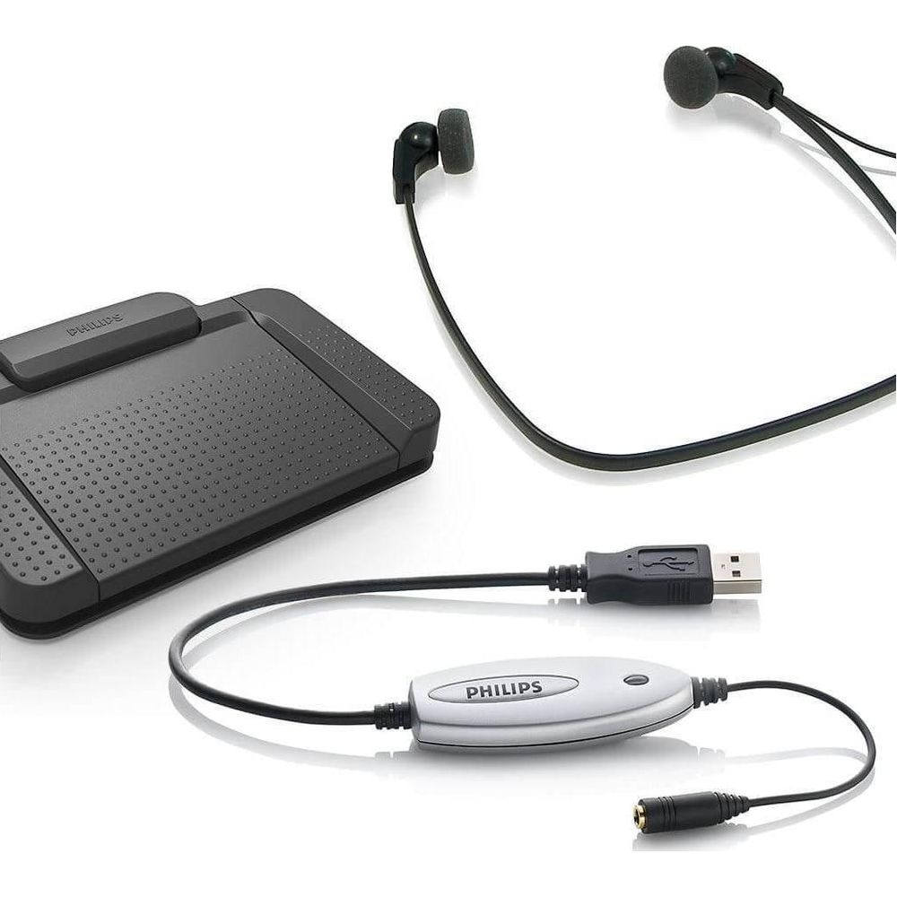 Philips-Ohrhörer mit USB-Adapter und Dockingstation auf weißem Hintergrund.