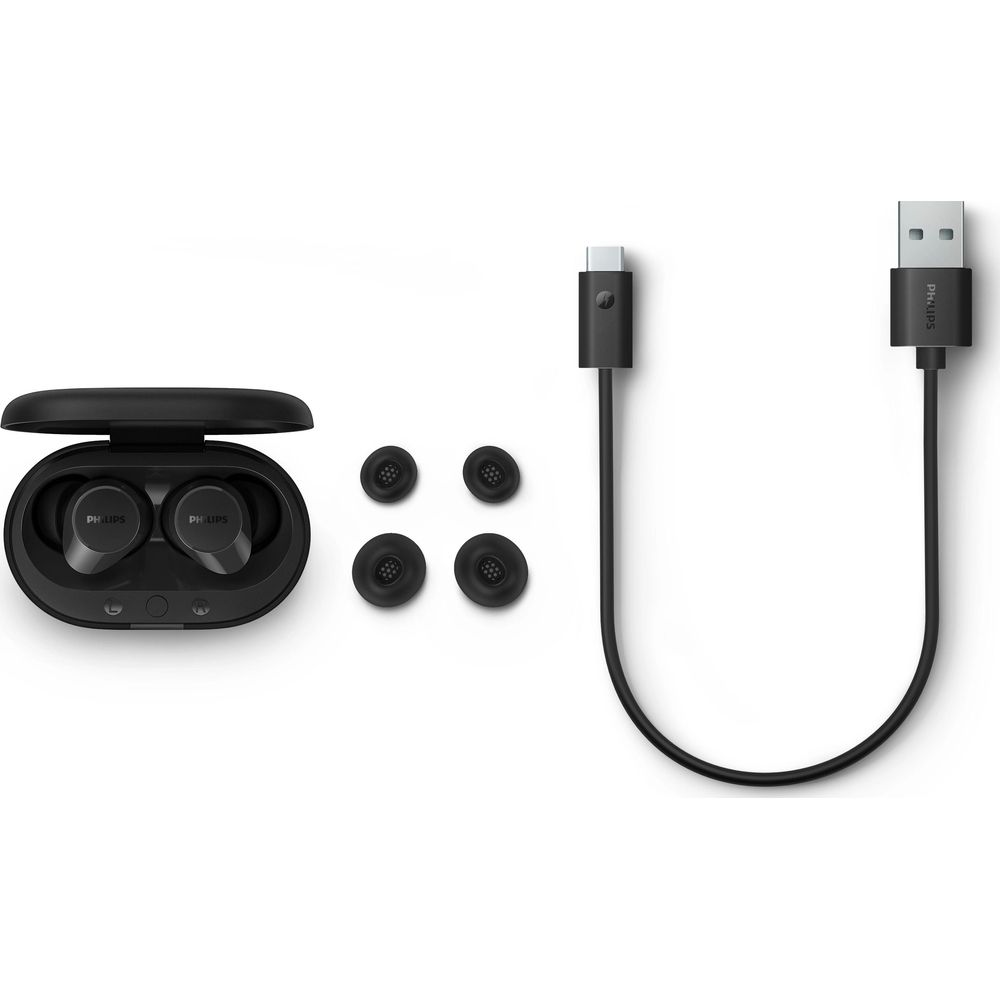 Auriculares Philips negros en estuche abierto, cuatro almohadillas y cable USB-C a USB-A.