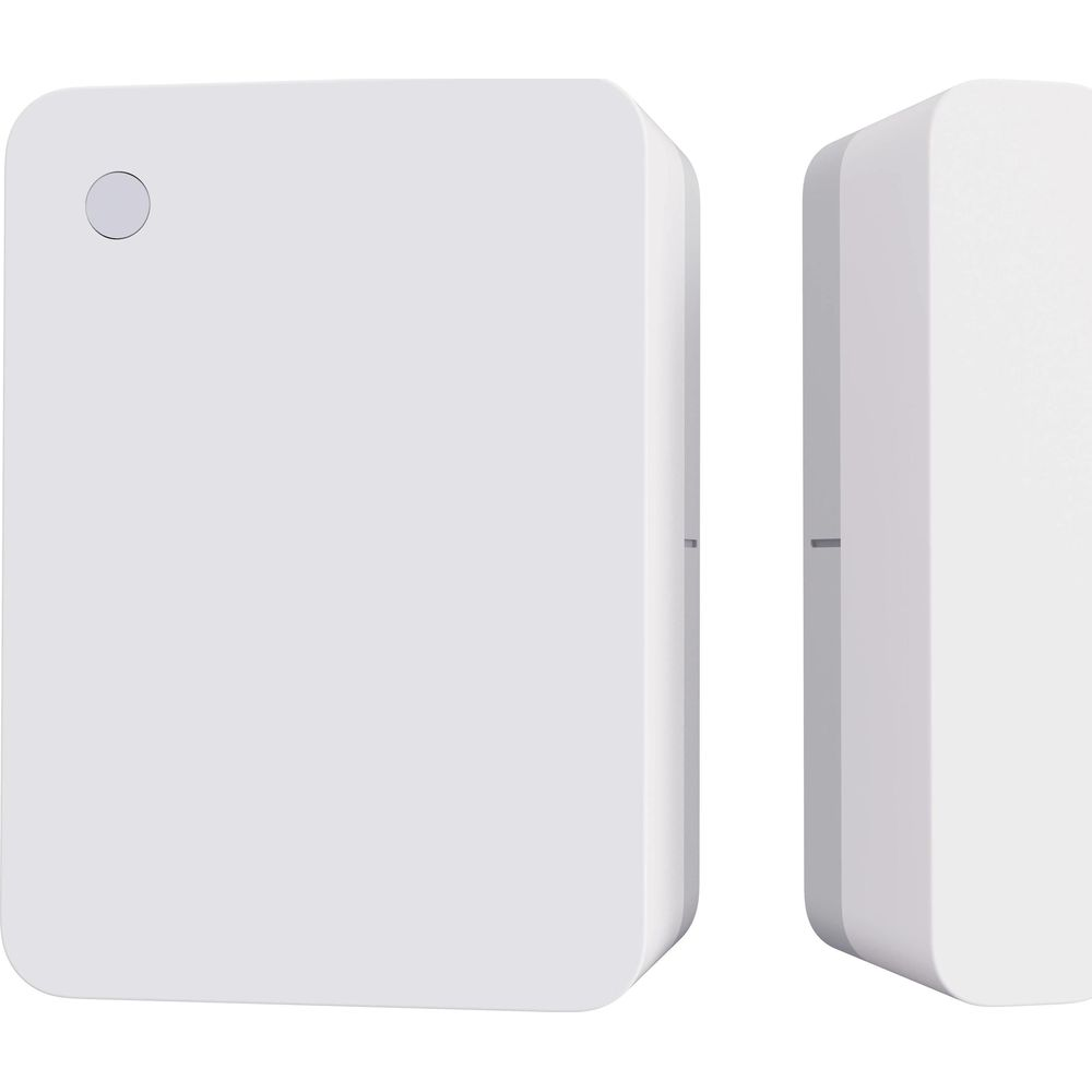 Dwa białe, prostokątne urządzenia z zaokrąglonymi rogami obok siebie.