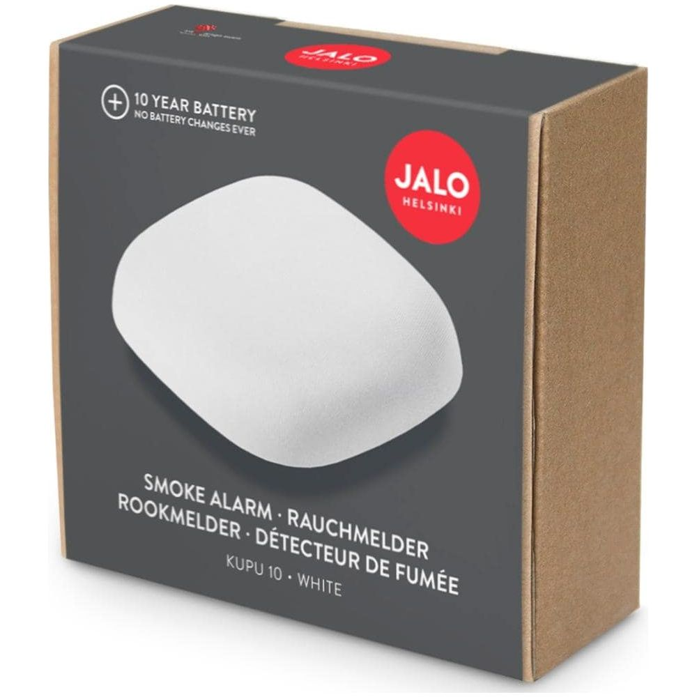 Détecteur de fumée blanc Jalo Helsinki avec batterie 10 ans sur emballage carton sombre.