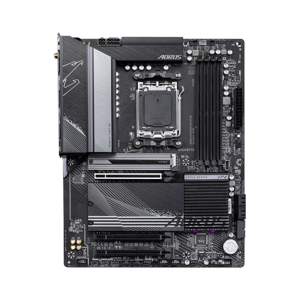 Una placa base negra con acentos plateados y muchos componentes.