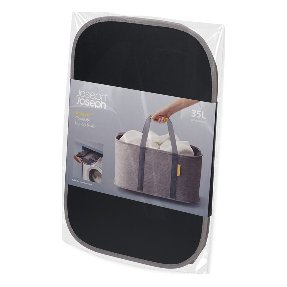 Cesto de ropa plegable gris con asas, lleno de toallas blancas.