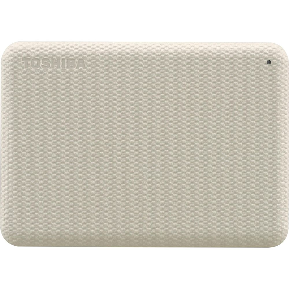 Kremowy dysk twardy Toshiba z teksturowaną powierzchnią i małą czarną kropką.